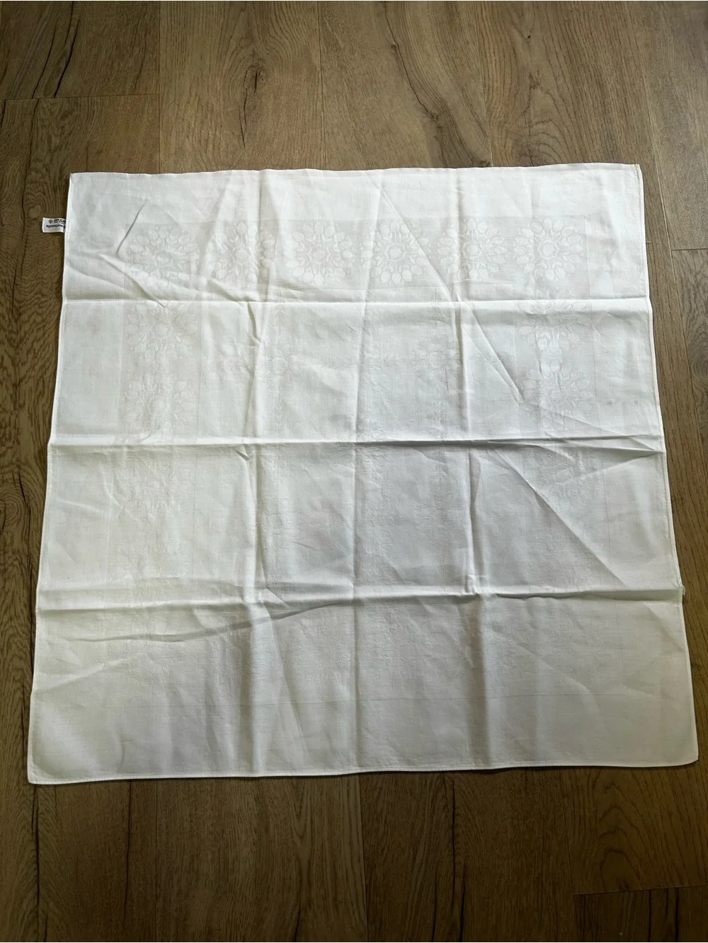 Elegant White Damask Table Linen with Floral Medallion